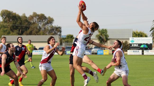 Traralgon's Tom Hamilton takes a strong overhead mark against Bairnsdale. Picture: Rachel Gaskell