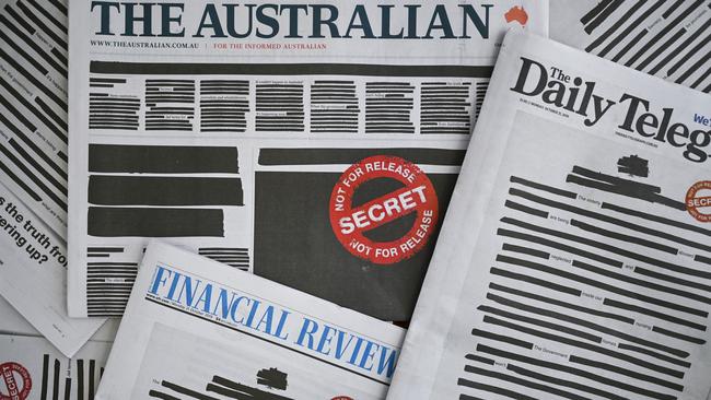 The front pages of Australia’s newspapers replicated a heavily redacted government document as part of a campaign challenging laws that effectively criminalise journalism and whistleblowing. Picture: AAP/Lukas Coch