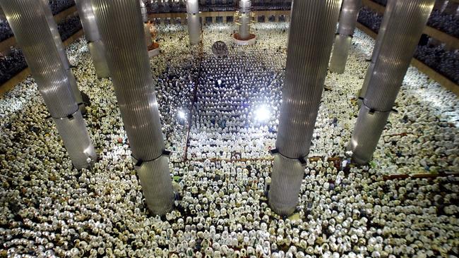 Once a moderate nation, Indonesia’s Muslims (above, at the Istiqlal Mosque in Jakarta during Ramadan) are radicalising under Saudi Arabia’s influence. Picture: News Corp.