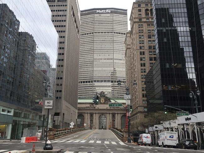 The road is empty in front of the MetLife Building and Grand Central Terminal in New York City.