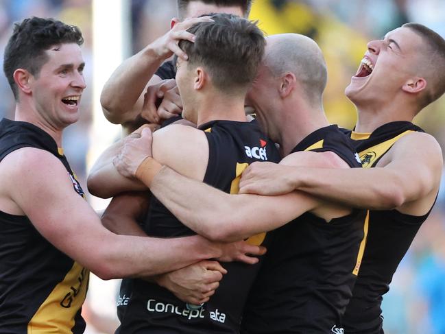 Tigers players celebrate winning after the 2023 SANFL Grand Final between Sturt and Glenelg at Adelaide Oval in Adelaide, Sunday, September 24, 2023. (SANFL Image/David Mariuz)