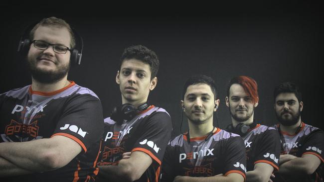 Essendon's eSports team (from left) Christian “Sleeping” Tiensuu, Alan “Tiger” Roger, Carlo “Looch” La Civita, Andrew “Rosey” Rose and captain Sebastian “Seb” de Ceglie. Picture: Essendon Football Club