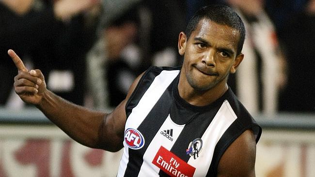  Collingwood v North Melbourne. MCG. Leon Davis celebrates a snapped goal from the pocket. 