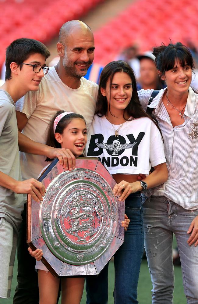 Manchester City manager Pep Guardiola with the Community Shield trophy and wife Cristina Serra and children Valentina Guardiola, Maria Guardiola and Marius Guardiola. (Photo: Mike Egerton/PA Images via Getty Images)