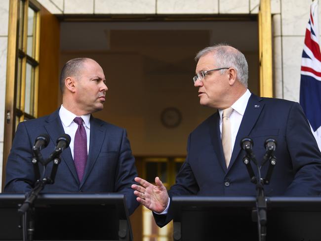 Australian Prime Minister Scott Morrison (right) and Australian Treasurer Josh Frydenberg speak to the media during a press conference at Parliament House in Canberra, Thursday, March 12, 2020. (AAP Image/Lukas Coch) NO ARCHIVING