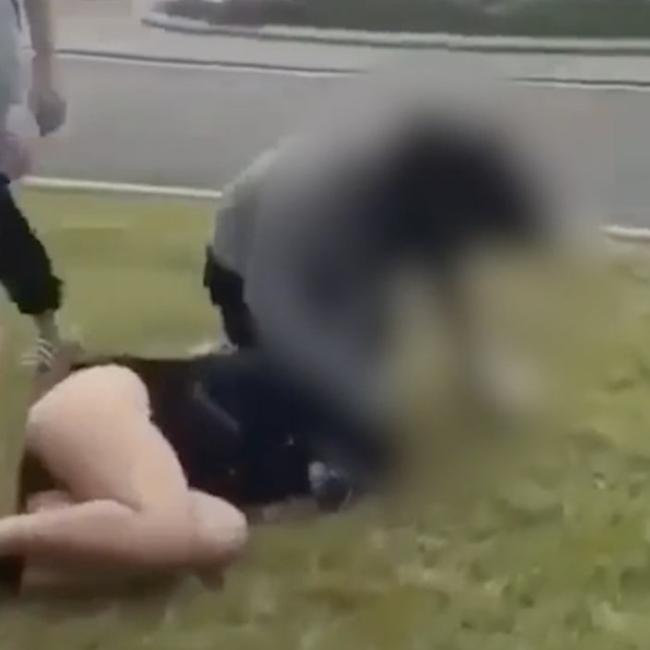 The girl was attacked by two others.