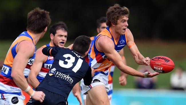 09/05/15 - SANFL: Central District v South Adelaide, at Playford Alive Oval in Elizabeth. Panthers' Pat Kerin attempts to tackle Bulldogs' Jacob Gillbee. Photo Tom Huntley