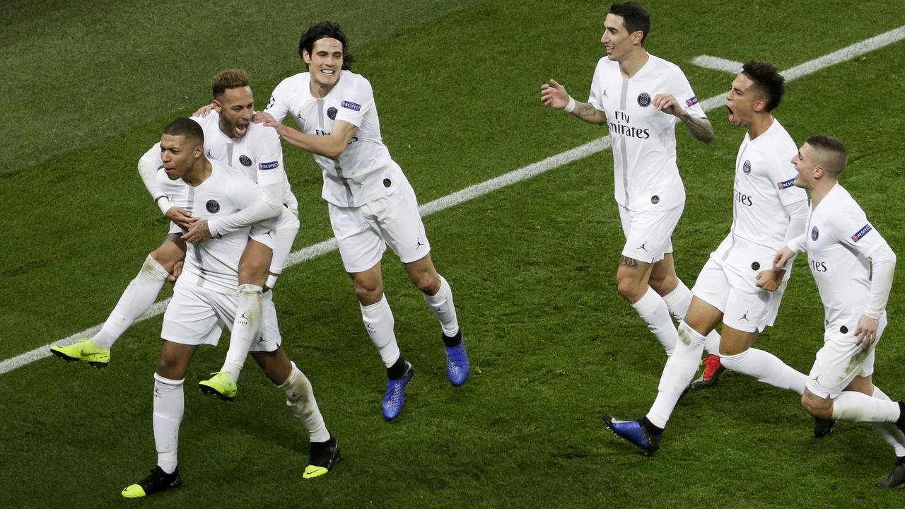 Paris Saint-Germain's Brazilian forward Neymar celebrates Kylian Mbappe and teammates after scoring