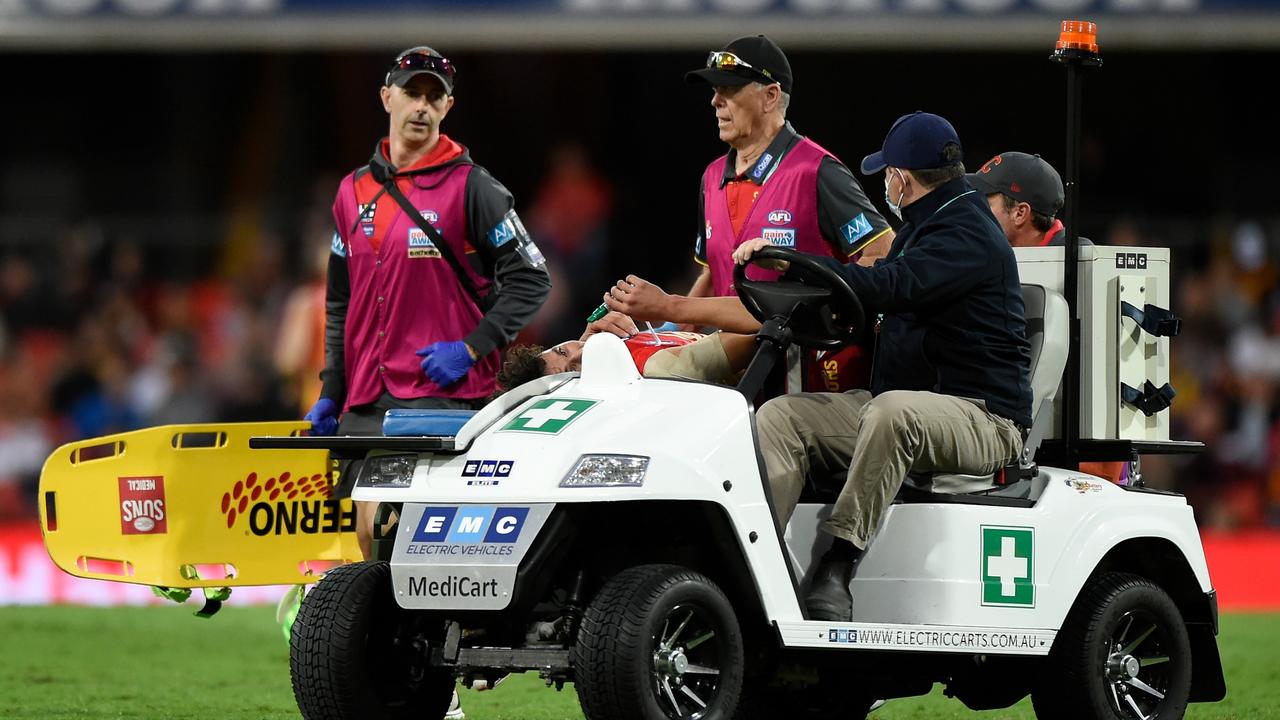 Powell was taken off on the stretcher and had the green whistle. Picture: Matt Roberts/AFL Photos/Getty Images