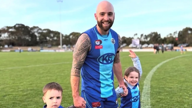 Kilmore captain Mick Marrett with his children.