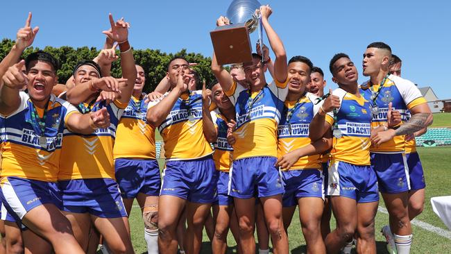 Patrician Brothers Blacktown players celebrating their win in the 2020 NRL Schoolboy Cup at Leichhardt Oval. Pic: Richard Dobson