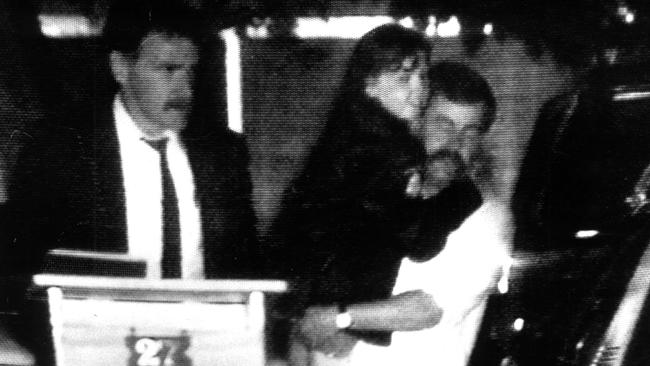 Sharon Wills is carried by a policeman after being found on a street corner 18 hours after she was abducted. File picture