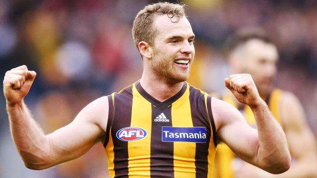 MELBOURNE, AUSTRALIA - AUGUST 04:  Tom Mitchell of the Hawks celebrates the win on the final siren during the round 20 AFL match between the Hawthorn Hawks and the Essendon Bombers at Melbourne Cricket Ground on August 4, 2018 in Melbourne, Australia.  (Photo by Michael Dodge/Getty Images)