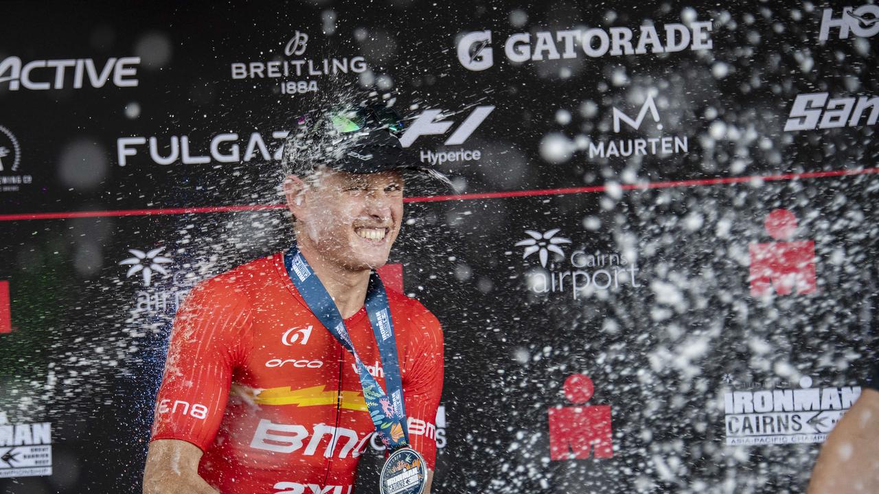 Cairns Iron Man - Pro Winner Max Neumann celebrates his win . Picture: Brian Cassey