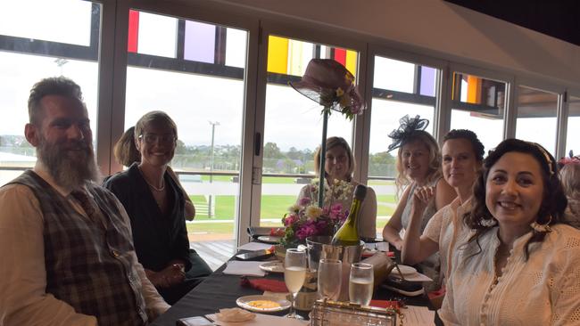 Mick Nicholls, Simone Barter, Kate Cartwright, Dee White, Bec Duggan and Kikki Watt at the Pavilion on Melbourne Cup Day 2022.