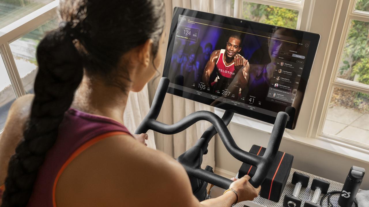 The Peloton screen makes you feel like you’re in a studio.