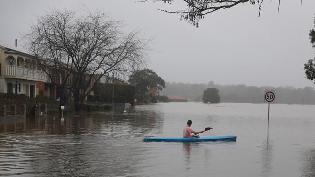 Residents are being urged to save water as heavy rainfall smashes the coast. Picture: John Grainger