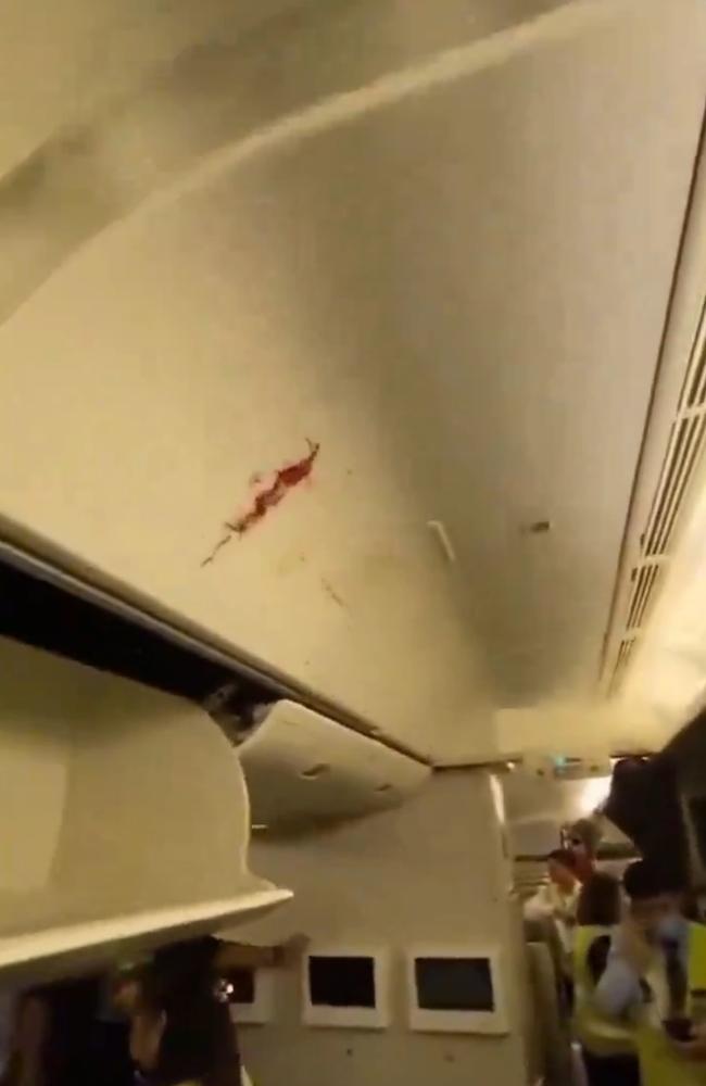 Blood on the ceiling after the incident on Singapore Airlines SQ321. Picture: X/Twitter