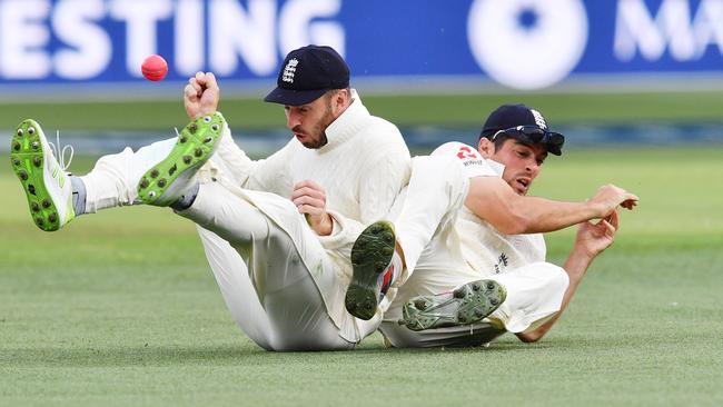 James Vince and Alastair Cook collide in a failed attempt to catch Shaun Marsh. Picture: AAP