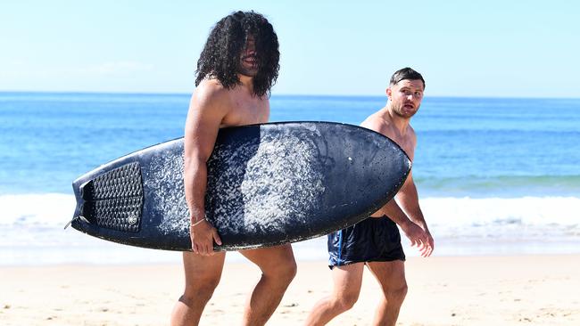 Titans centre Konrad Hurrell lets his hair down on a trip to the beach. Picture: AAP Image/Dave Hunt