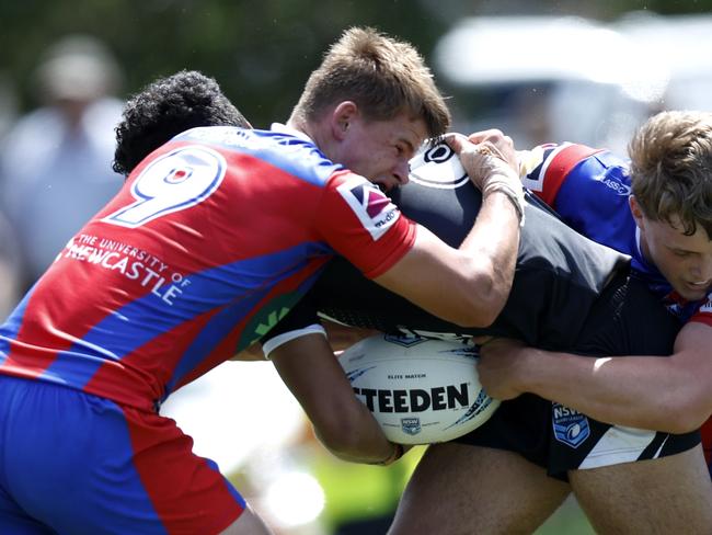 Diesel Hagan makes a tackle. Picture: Michael Gorton. NSWRL Junior Reps, Harold Matthews Cup round three, Newcastle Knights vs Western Suburbs Magpies at St Johns Oval, 17 February 2024