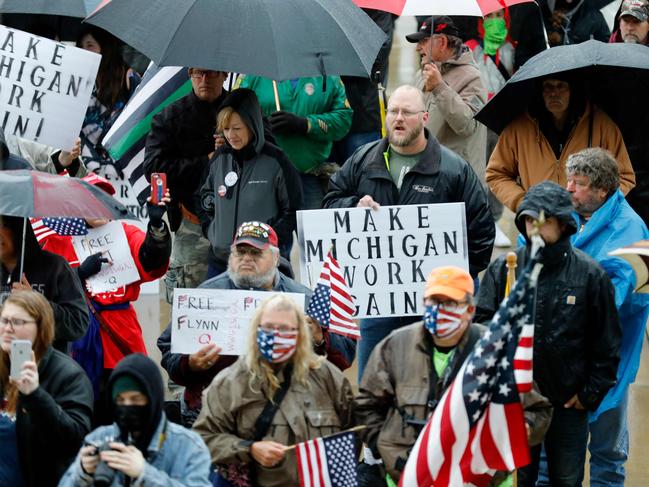 Demonstrators protest in Lansing, Michigan, during a rally organised by Michigan United for Liberty. Picture: Jeff Kowalsky/AFP