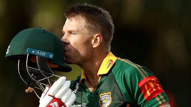 SYDNEY, AUSTRALIA - SEPTEMBER 22:  David Warner of Randwick Petersham celebrates after reaching his century during the NSW First Grade Club Cricket match between Randwick Petersham and St George at Coogee Oval on September 22, 2018 in Sydney, Australia.  (Photo by Ryan Pierse/Getty Images)