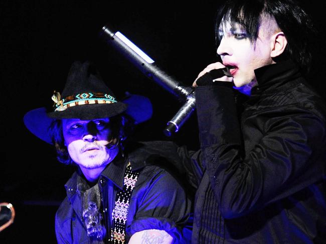 Johnny Depp performs on stage with Marilyn Manson. Manson texted Depp that he had “(A)mber type scenarios” referencing abuse allegations. Picture: Getty Images