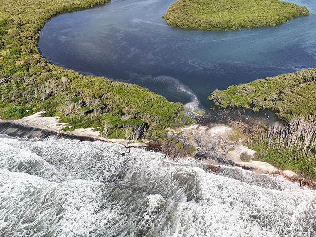 Drone shots attached of the area where water has flowed over Bribie Island and where the next breakthrough could happen. , Photos: Shane T Reynolds
