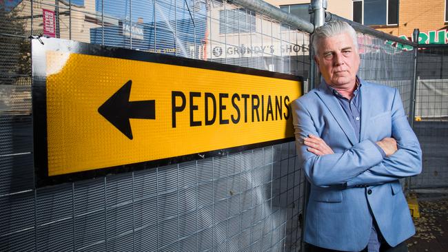 Enve Hair and Makeup owner Mark Faulkner is one of many Glenelg traders whose businesses have been impacted by roadworks along Jetty Rd. Picture: Matt Loxton