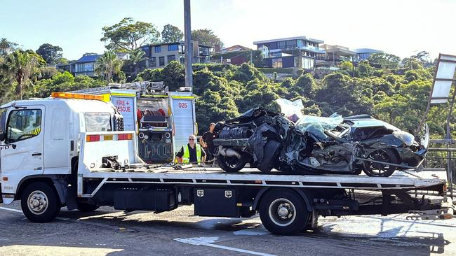 The person who was trapped inside the vehicle has since been transported to hospital. Picture: NewsWire / Ben Symons