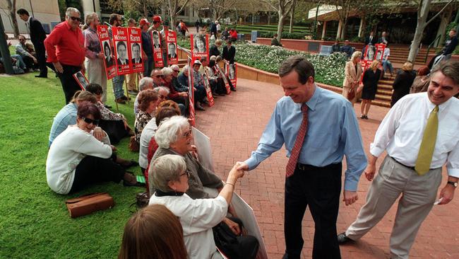 SA politician Mike Rann meeting people at Colonnades during the 2008 election campaign.