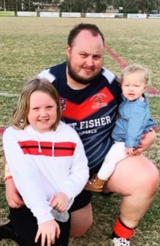 Nick 'Snake' Baker with his two beloved daughters, Mackenzie (L) and Zariah-Lea (R).