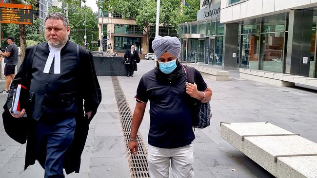 Jatinder Singh (right) leaves the County Court of Victoria with his barrister Martin Kozlowski. Picture: NewsWire / Liam Beatty