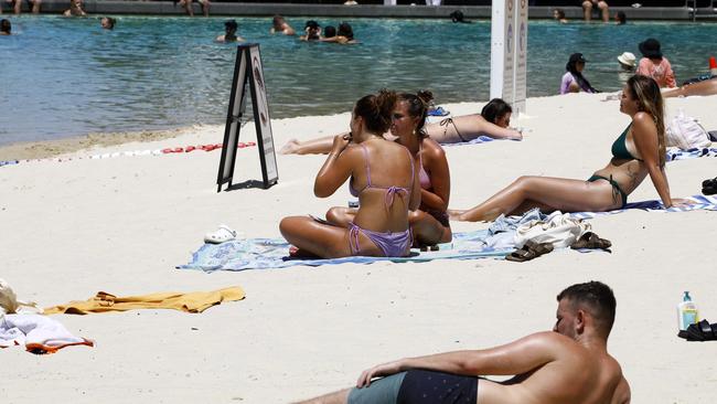 Pictured are members of the public cooling down at Streets beach in Brisbane as temperatures were up in the high thirties. Picture: NCA NewsWire/Tertius Pickard