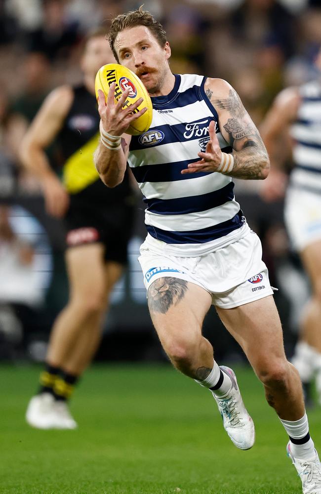 Zach Tuohy gets a handle on the ball. Picture: Michael Willson/AFL Photos via Getty Images