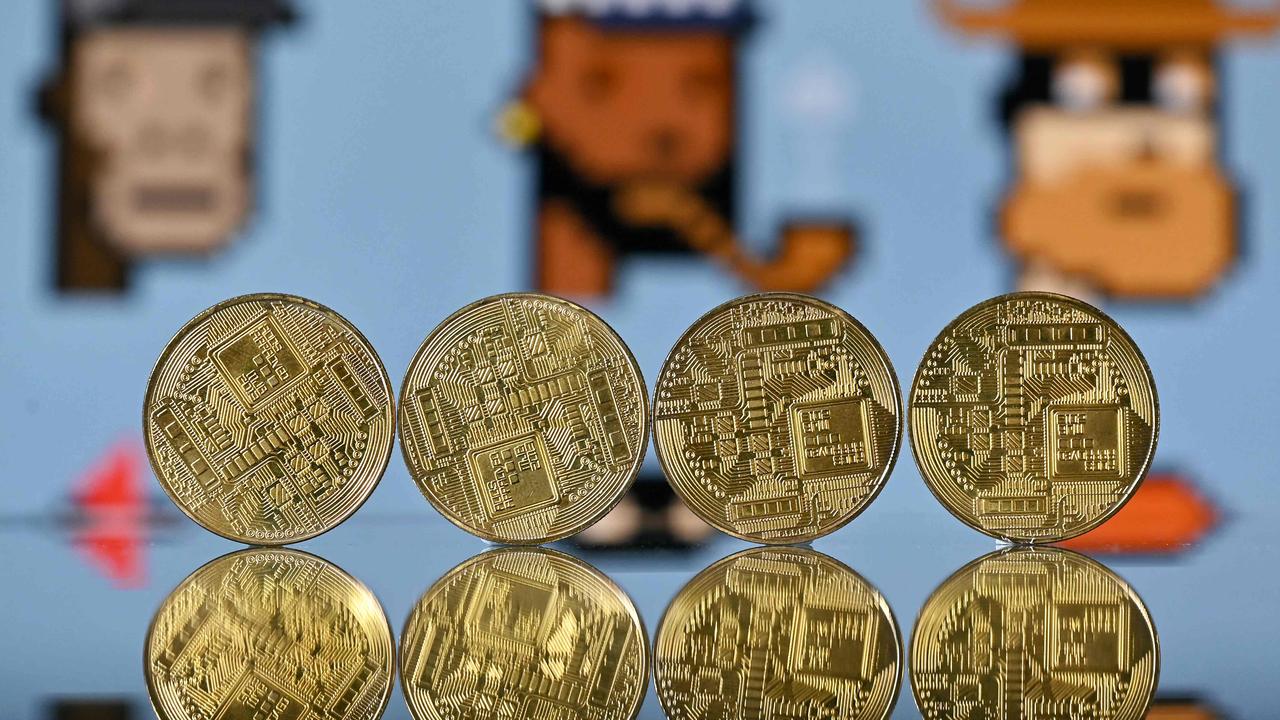 Crypto coins and NFTs. Picture: AFP.