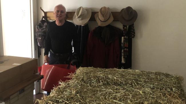 Hay in Michael Mobbs’ living room. Picture: Alex Turner-Cohen