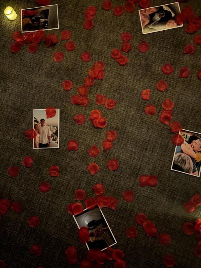 A trail of rose petals, photographs and candles led to Charlotte (Charli) Grant and Lachlan Cameron’s engagement. Picture: @charli_grant