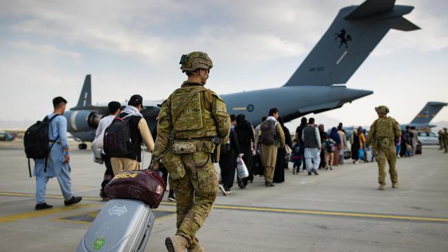 Australian citizens and visa holders prepare to board an evacuation flight from Kabul. Picture: Supplied/Australian Department of Defence