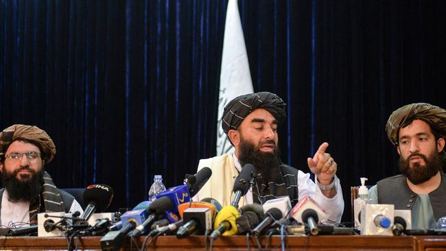 Taliban spokesperson Zabihullah Mujahid (centre) addresses the first press conference in Kabul on August 17, 2021 following the Taliban stunning takeover of Afghanistan. Picture: Hoshang Hashimi/AFP