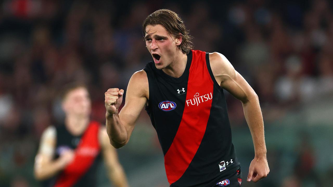 MELBOURNE, AUSTRALIA – MARCH 30: Harrison Jones of the Bombers celebrates kicking a goal during the round three AFL match between Essendon Bombers and St Kilda Saints at Marvel Stadium, on March 30, 2024, in Melbourne, Australia. (Photo by Quinn Rooney/Getty Images)