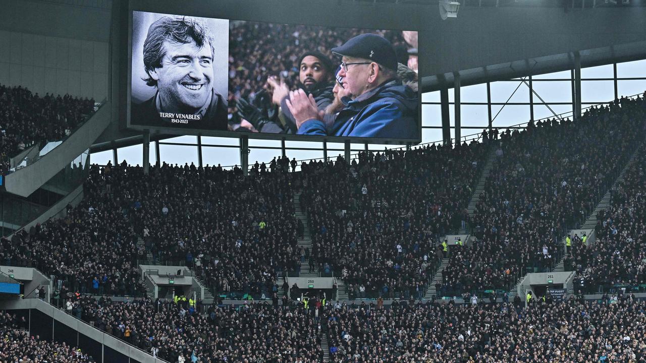 A picture of former England player and coach Terry Venables is shown on the video screen following the announcement of his passing away prior to Tottenham’s game on Monday morning. Photo by Ben Stansall / AFP.