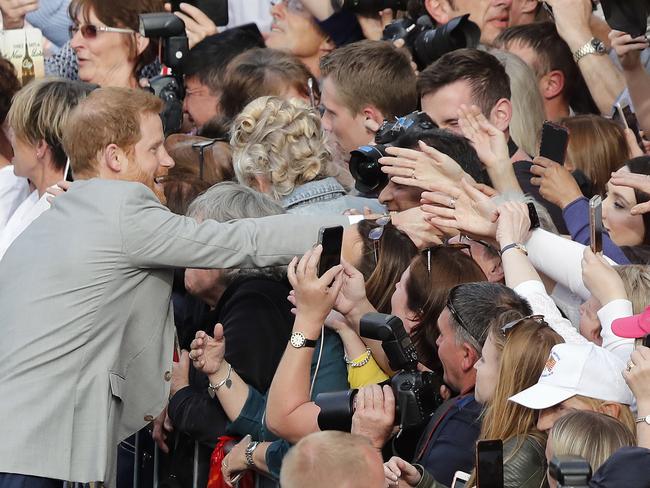 Britain's Prince Harry reacts as he greets crowds in Windsor, near London. Picture: AP