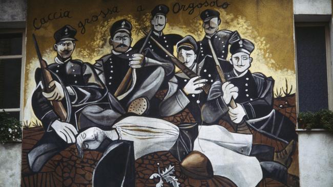 A beautiful wall painting in Orgosolo evoking the massacre of Murguliai from 1899 is an example of the rich history the island of Sardinia is offering Americans.