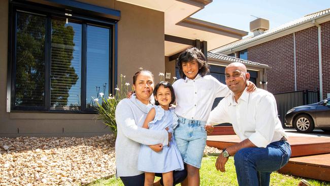 Joseph and Kristine Van with children Jeremiah, 8, and Miriam, 4, at their Craigieburn house for sale. Picture: Mark Stewart