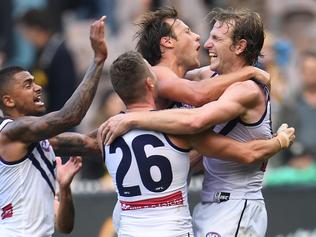 Dockers players react after David Mundy (right) kicked a goal after the siren to win the Round 8 AFL match between the Richmond Tigers and the Fremantle Dockers at the MCG in Melbourne, Sunday, May 14, 2017. (AAP Image/Julian Smith) NO ARCHIVING, EDITORIAL USE ONLY