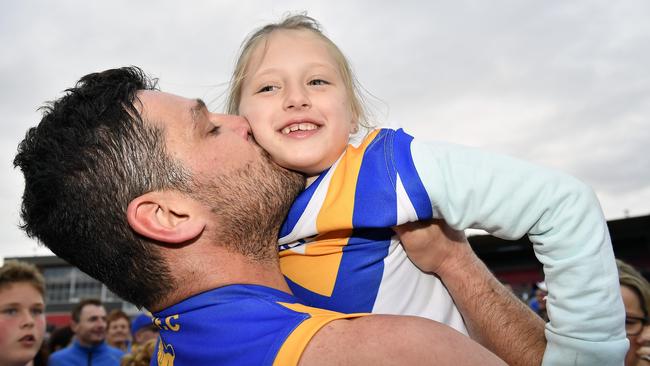 Fevola celebrates Deer Park’s 2016 premiership with daughter Lulu.