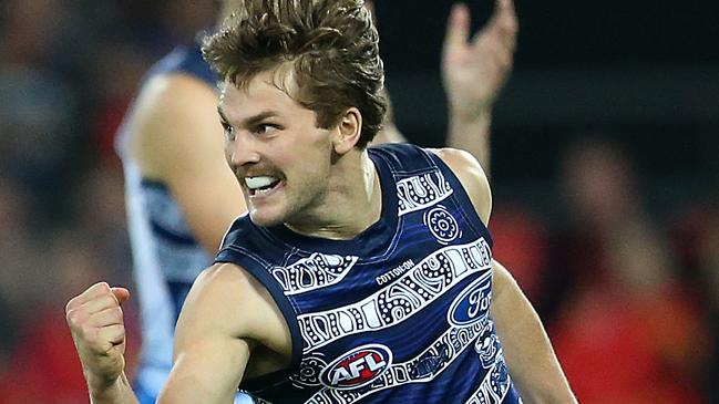 First-year Cat Tom Atkins has injected a toughness into ladder leader Geelong’s midfield. Picture: Jono Searle/AFL Photos/Getty Images.