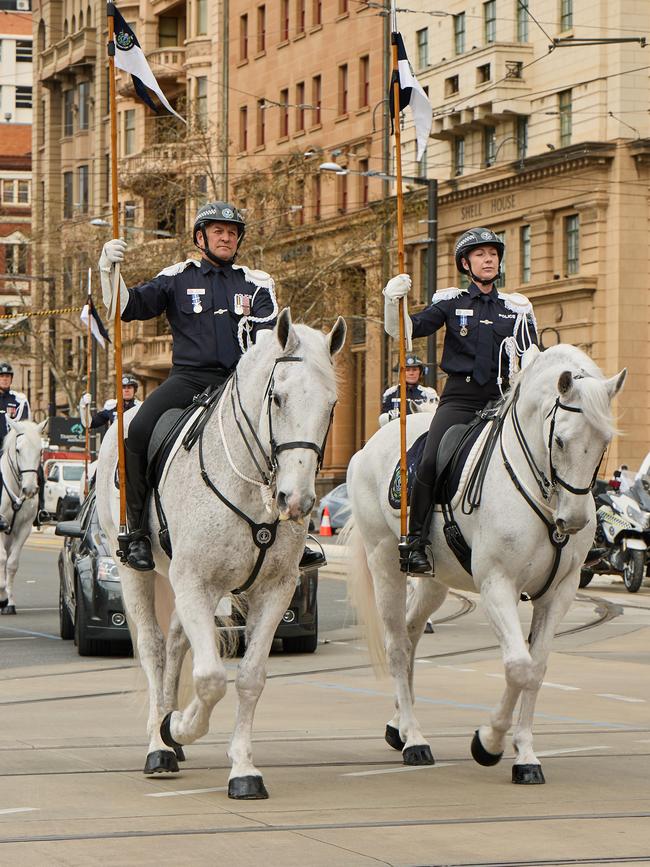 Mounted police lead the Governor’s car to Parliament House. Picture: Matt Loxton
